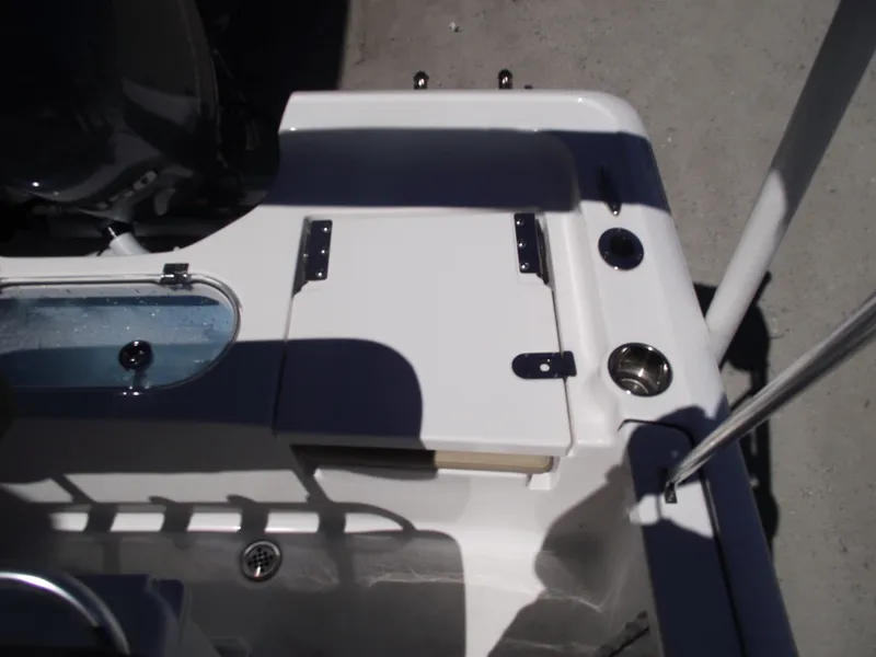 Slide: The Image of 2022 Tidewater 1910 Bay Max boat deck with storage and cup holder. - 31