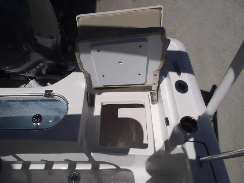 Slide: The Image of 2022 Tidewater 1910 Bay Max boat storage compartment and seating area. - 33