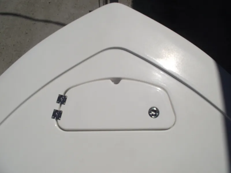 Slide: The Image of 2022 Tidewater 1910 Bay Max boat hatch with metal hinges and latch. - 7