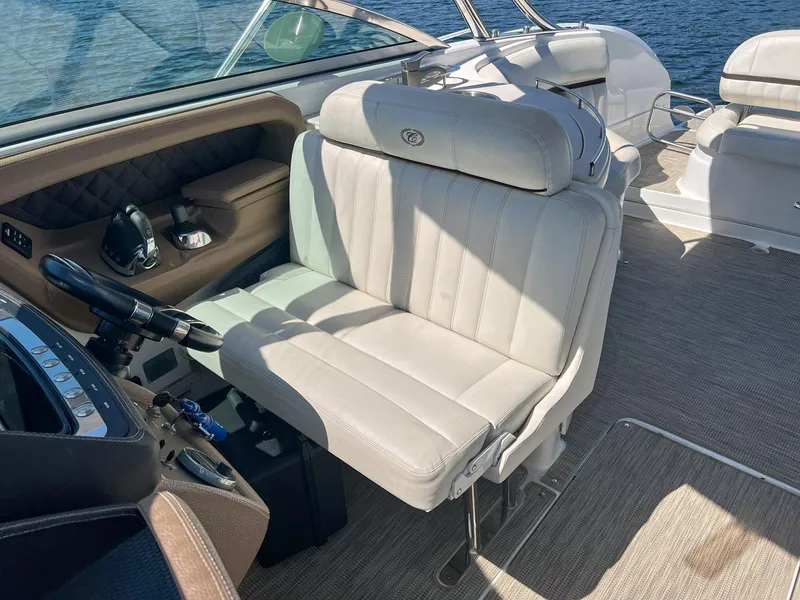 Slide: The Image of Luxury seating on a 2016 Cobalt 336 boat, featuring plush white upholstery. - 17