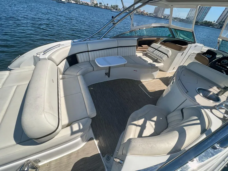 Slide: The Image of Luxurious 2016 Cobalt 336 boat interior with spacious seating and scenic water view. - 20