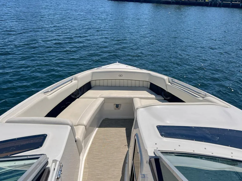 Slide: The Image of 2016 Cobalt 336 boat bow with seating, on calm water. - 5