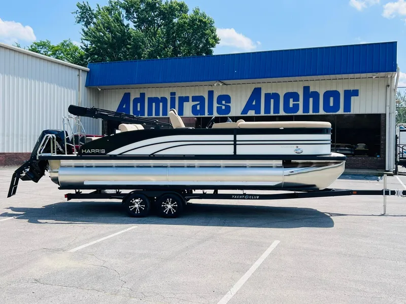 The Image of 2025 Harris Sunliner 230 pontoon boat on trailer at Admirals Anchor dealership. - 1