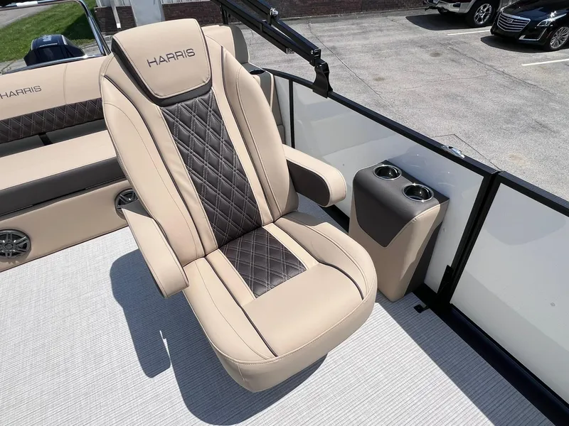 Slide: The Image of Luxurious seating on 2025 Harris Sunliner 230 pontoon boat with cup holders. - 19
