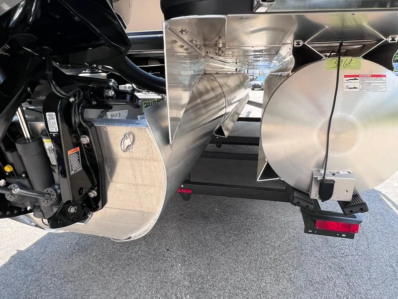 Slide: The Image of Underneath view of 2025 Harris Sunliner 230 pontoon boat, showcasing metallic components. - 27