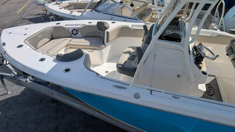 Slide: The Image of 2025 Key West 263 FS boat with spacious seating and modern design. - 5