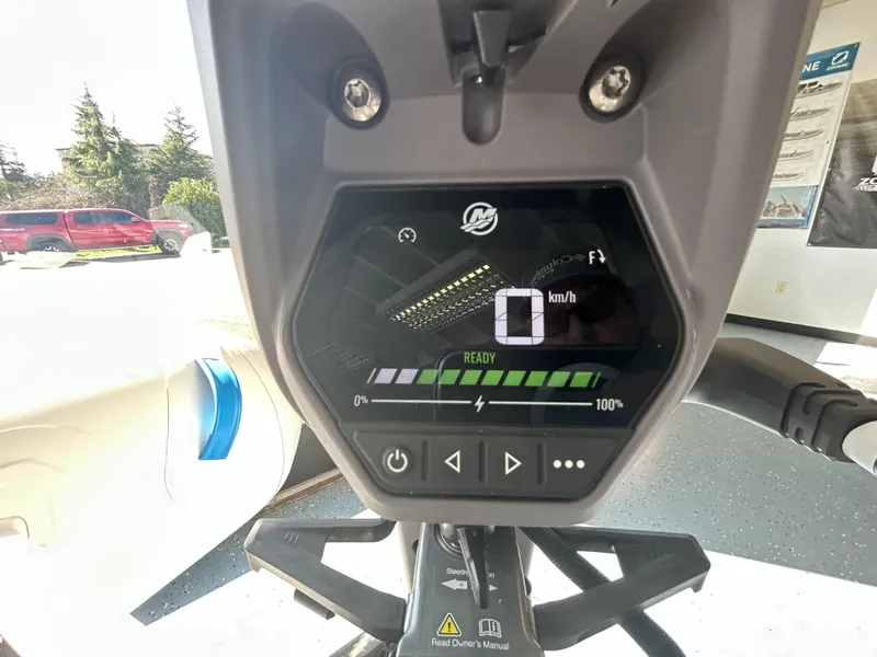 Slide: The Image of 2024 Zodiac Nomad 3.1 RIB Alu dashboard displaying speed and battery status. - 9
