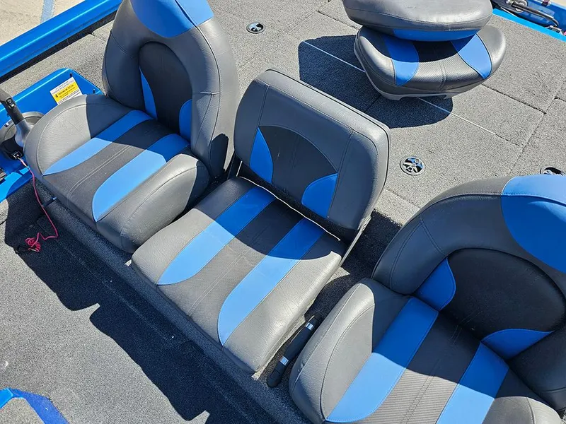 Slide: The Image of 2022 Vexus AVX1880 boat interior with blue and gray seating. - 13