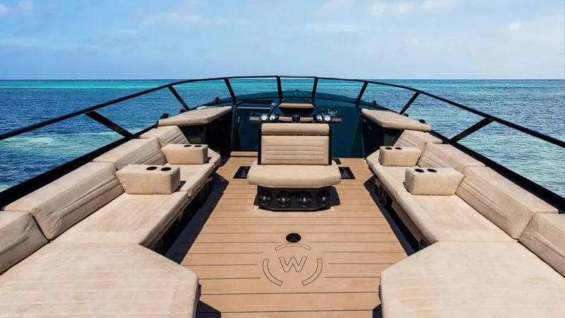 Slide: The Image of Luxurious 2025 Waterdream California 52XT yacht deck with elegant seating and ocean view. - 13
