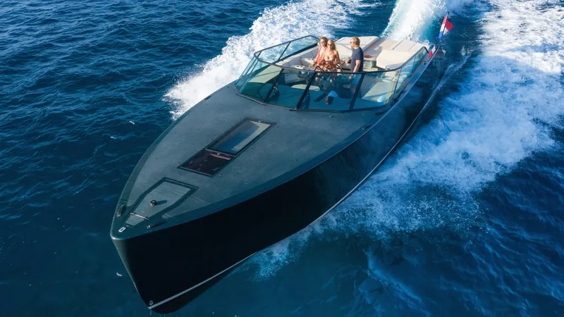 Slide: The Image of Luxury Waterdream California 52XT yacht cruising on open sea, 2025 model. - 2