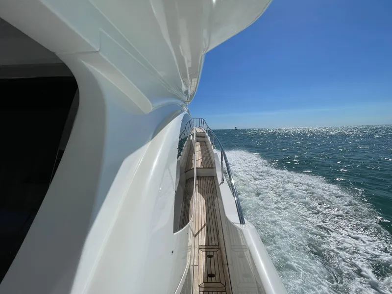 Slide: The Image of Azimut 70 yacht cruising on open water, 2014 model, sunny day, ocean view. - 21