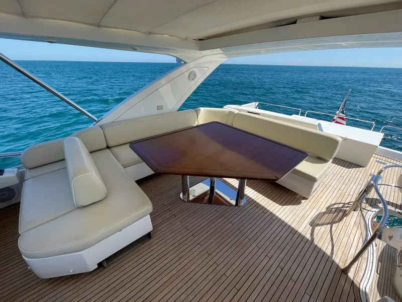 Slide: The Image of Luxurious 2014 Azimut 70 yacht deck with elegant seating and ocean view. - 30