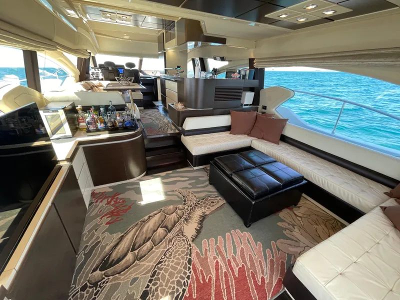 Slide: The Image of Luxurious interior of 2014 Azimut 70 yacht with ocean view and elegant seating area. - 42