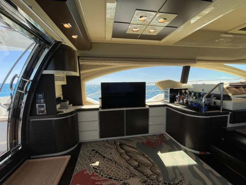 Slide: The Image of Luxurious interior of a 2014 Azimut 70 yacht with modern furnishings and ocean view. - 44