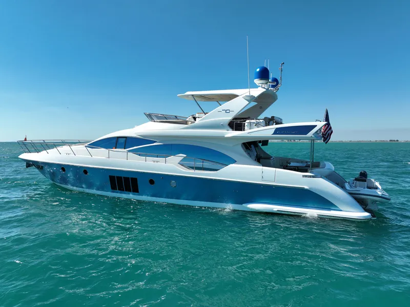 Slide: The Image of Luxury 2014 Azimut 70 yacht cruising on clear blue ocean waters. - 8