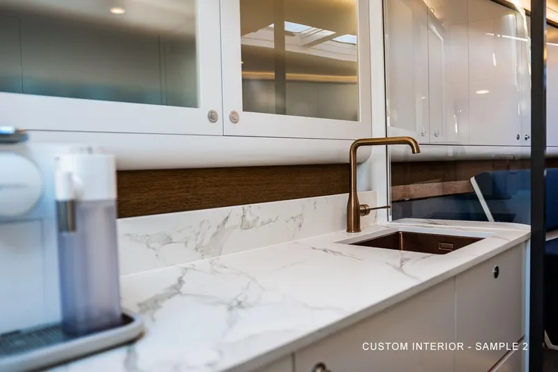 Slide: The Image of Luxurious kitchen interior of 2025 Waterdream California 52XT Hardtop with marble countertop. - 11