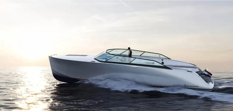 Slide: The Image of 2025 Waterdream California 52XT Hardtop cruising on open water at sunset. - 22
