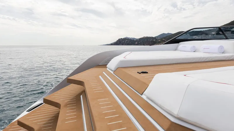 Slide: The Image of Luxurious Waterdream California 52XT yacht deck with sunbeds, overlooking serene ocean view. - 3