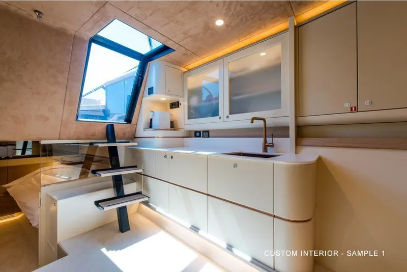 Slide: The Image of Modern kitchen interior of 2025 Waterdream California 52XT Hardtop yacht, featuring sleek cabinetry and skylight. - 7