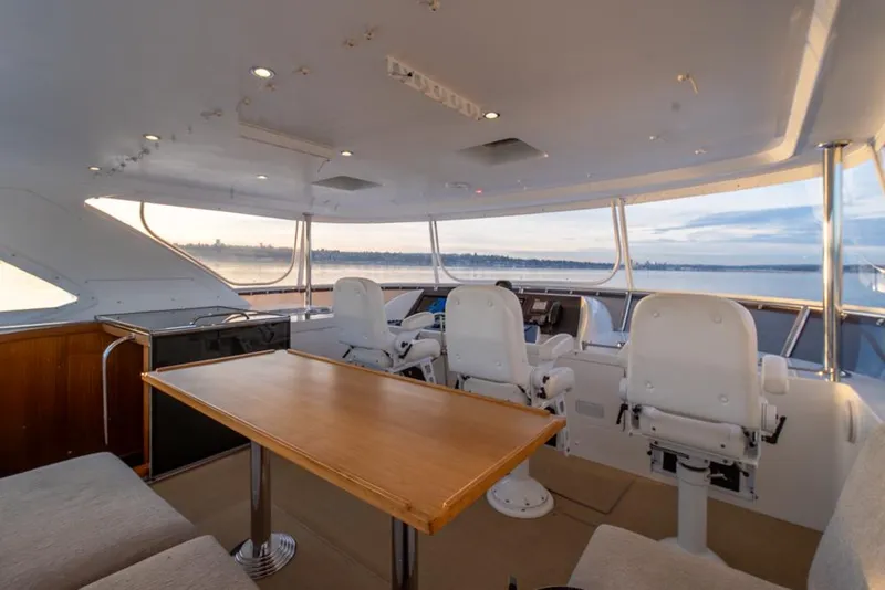 Slide: The Image of Luxurious interior of 2010 Ocean Alexander 80' Motoryacht with helm and seating area. - 11