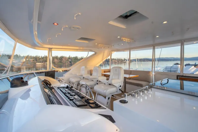 Slide: The Image of Luxurious 2010 Ocean Alexander 80' Motoryacht interior with helm, seating, and panoramic views. - 13
