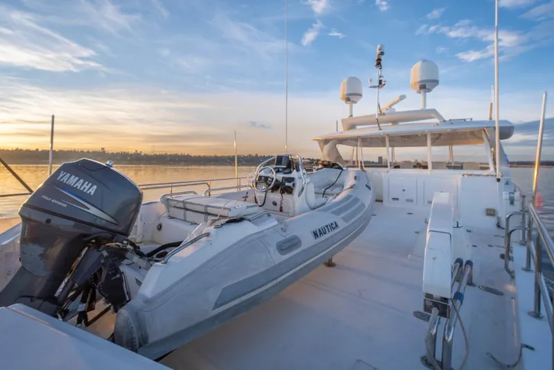 Slide: The Image of Ocean Alexander 80' Motoryacht 2010 with tender at sunset, featuring Yamaha engine. - 18