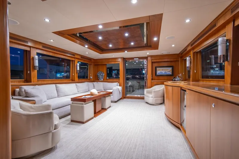 Slide: The Image of Luxurious interior of 2010 Ocean Alexander 80' Motoryacht with elegant seating and wood finishes. - 20