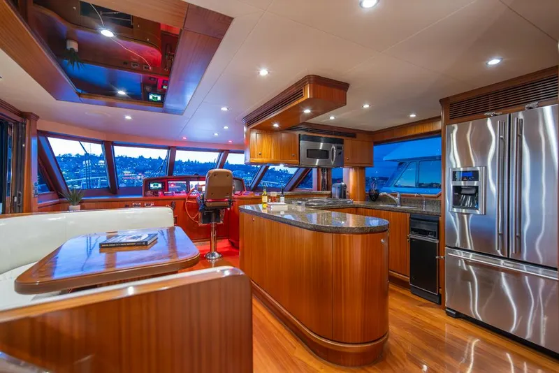 Slide: The Image of Luxurious interior of 2010 Ocean Alexander 80' Motoryacht with modern kitchen and panoramic windows. - 23