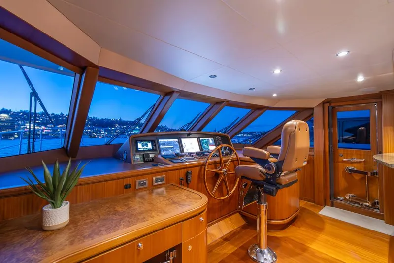 Slide: The Image of Luxurious helm of 2010 Ocean Alexander 80' Motoryacht with panoramic windows and modern controls. - 27