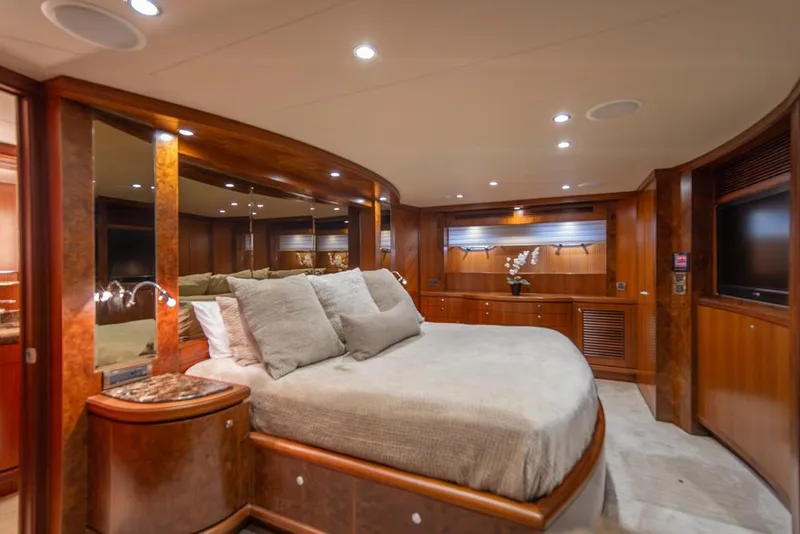 Slide: The Image of Luxurious bedroom interior of 2010 Ocean Alexander 80' Motoryacht with elegant wood finishes. - 32