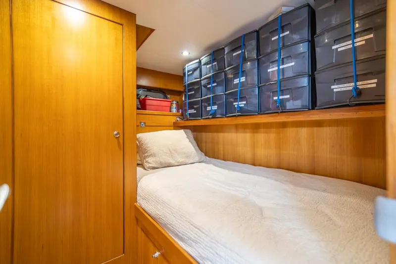 Slide: The Image of Cozy cabin with storage on 2010 Ocean Alexander 80' Motoryacht. - 44