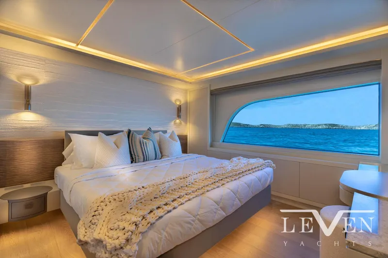 Slide: The Image of Luxurious bedroom interior of 2026 Van der Valk LeVen 90 yacht with ocean view. - 21