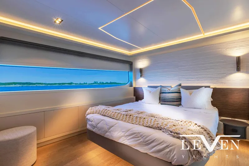 Slide: The Image of Luxurious bedroom interior of 2026 Van der Valk LeVen 90 yacht with modern lighting. - 25