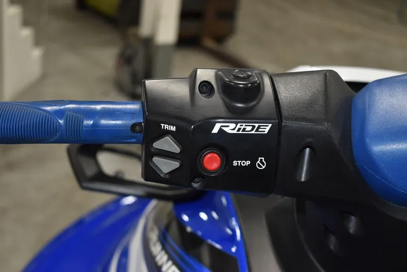 Slide: The Image of 2017 Yamaha WaveRunner GP1800 handlebar controls with trim and stop buttons. - 15