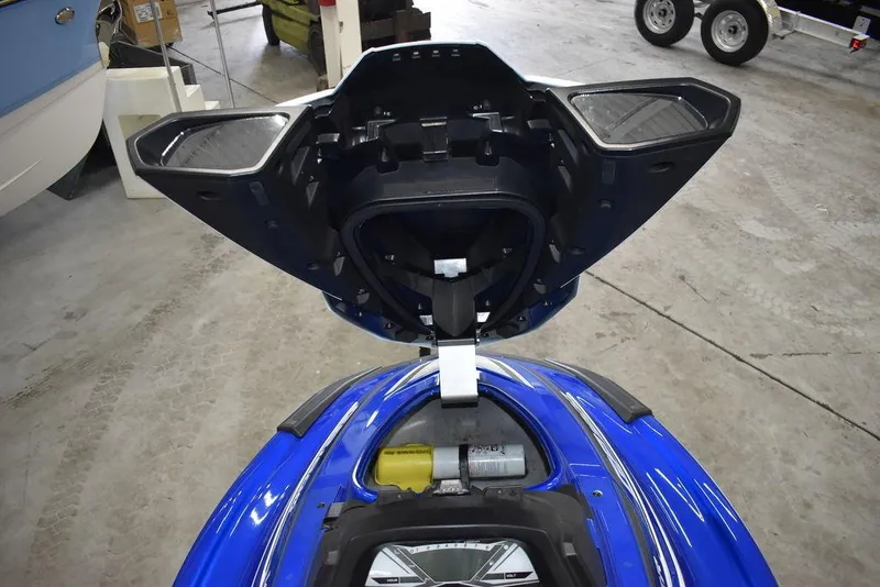 Slide: The Image of 2017 Yamaha WaveRunner GP1800 with open storage compartment in a garage setting. - 19