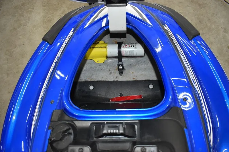 Slide: The Image of 2017 Yamaha WaveRunner GP1800 storage compartment with safety equipment, featuring a vibrant blue exterior. - 20