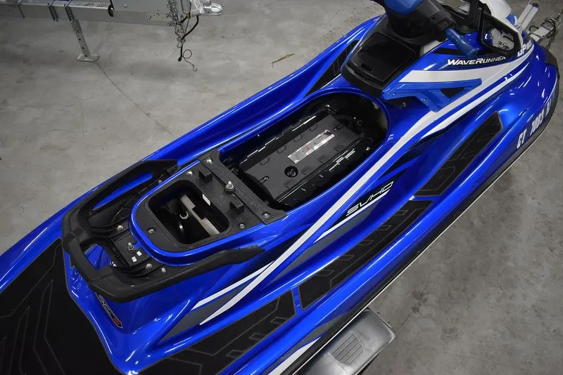 Slide: The Image of 2017 Yamaha WaveRunner GP1800 in blue, showcasing open storage compartment. - 22