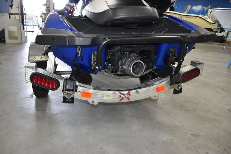 Slide: The Image of 2017 Yamaha WaveRunner GP1800 on trailer, rear view in garage setting. - 24