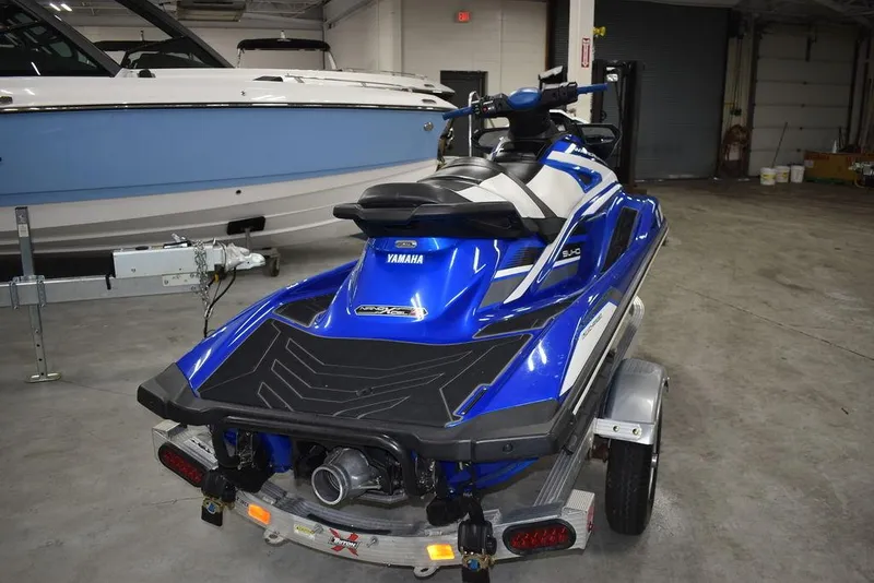 Slide: The Image of 2017 Yamaha WaveRunner GP1800 in a garage, blue and white, on a trailer. - 7