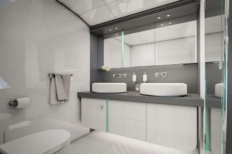 Slide: The Image of Luxurious bathroom in 2027 Van der Valk Pilot 26m yacht, featuring modern dual sinks and sleek design. - 17