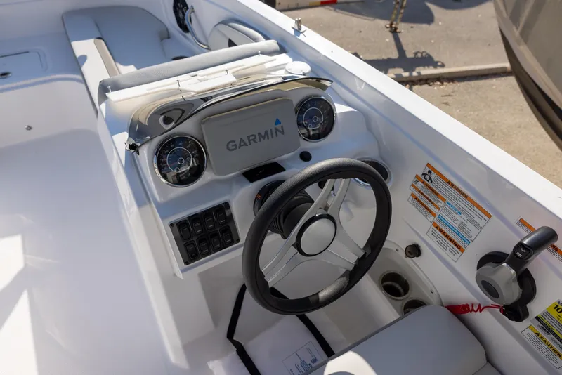 Slide: The Image of 2022 Hurricane SunDeck Sport 205 OB boat dashboard with Garmin navigation system. - 7