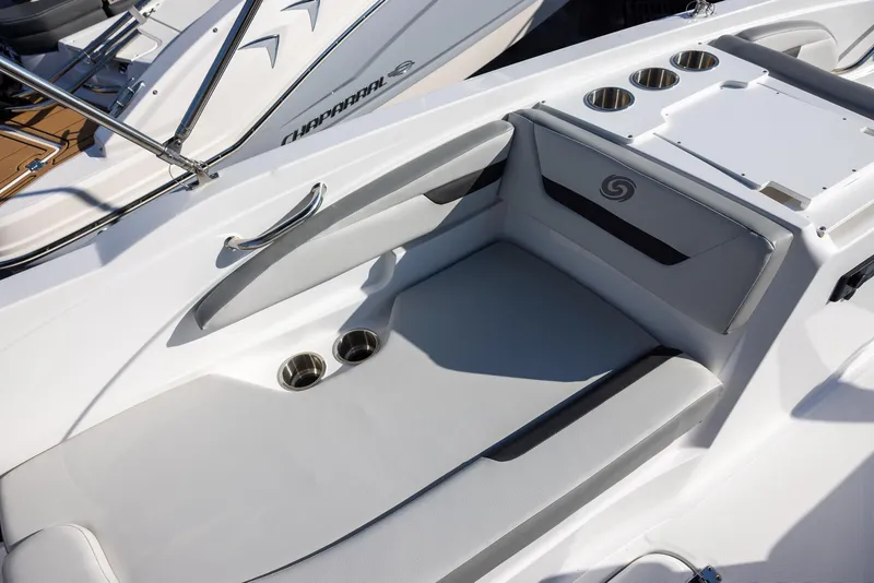 Slide: The Image of 2022 Hurricane SunDeck Sport 205 OB boat interior with seating and cup holders. - 8