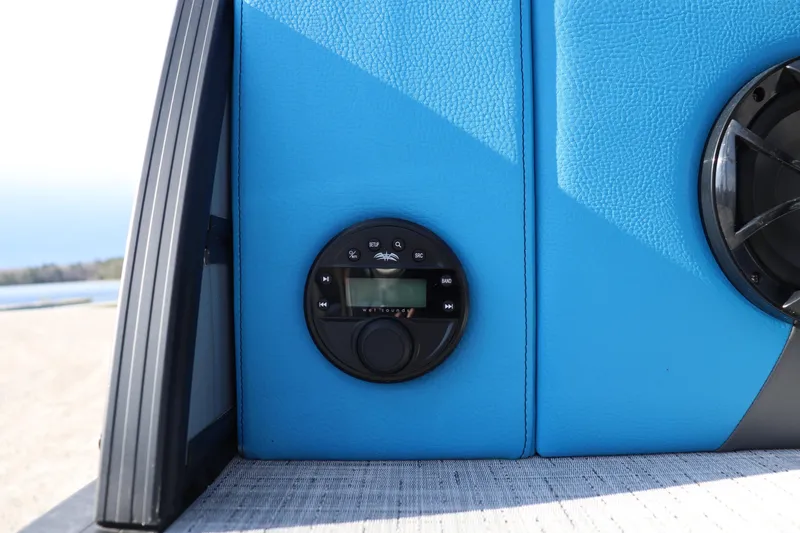 Slide: The Image of Control panel on blue Trifecta 23 ULE 2025 boat interior. - 14