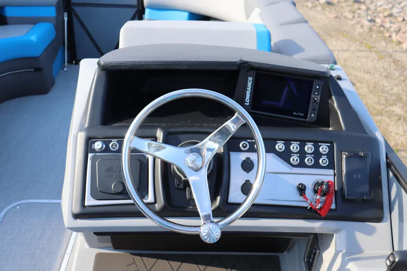 Slide: The Image of Steering console of 2025 Trifecta 23 ULE boat with modern controls and navigation system. - 7