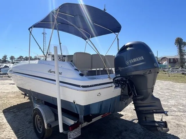 Slide: The Image of 2016 Hurricane CC 19 OB boat with Yamaha outboard motor on trailer. - 4
