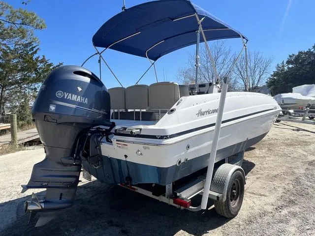 Slide: The Image of 2016 Hurricane CC 19 OB boat with Yamaha outboard motor on trailer. - 6