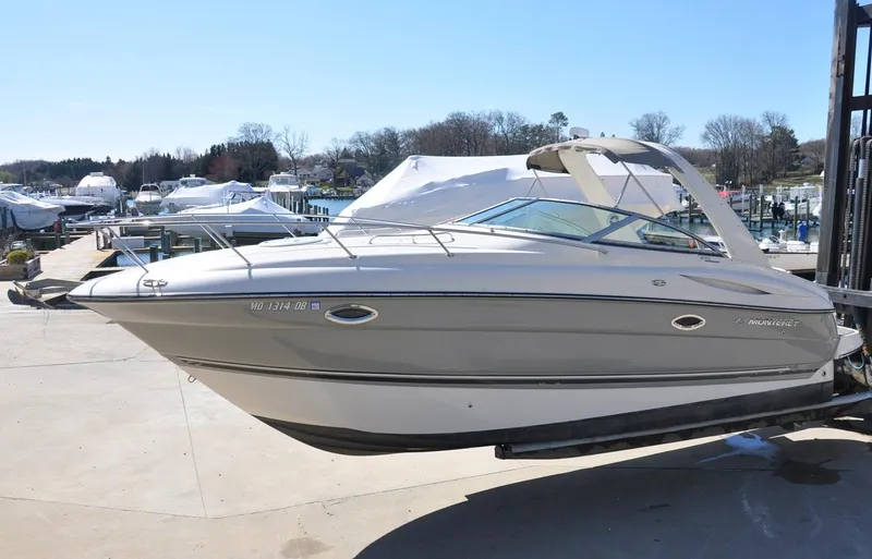 Slide: The Image of 2008 Monterey 270 Cruiser boat on display at a marina. - 1