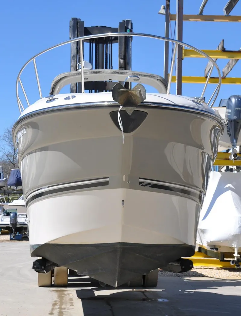 Slide: The Image of 2008 Monterey 270 Cruiser boat on dry dock, front view. - 11