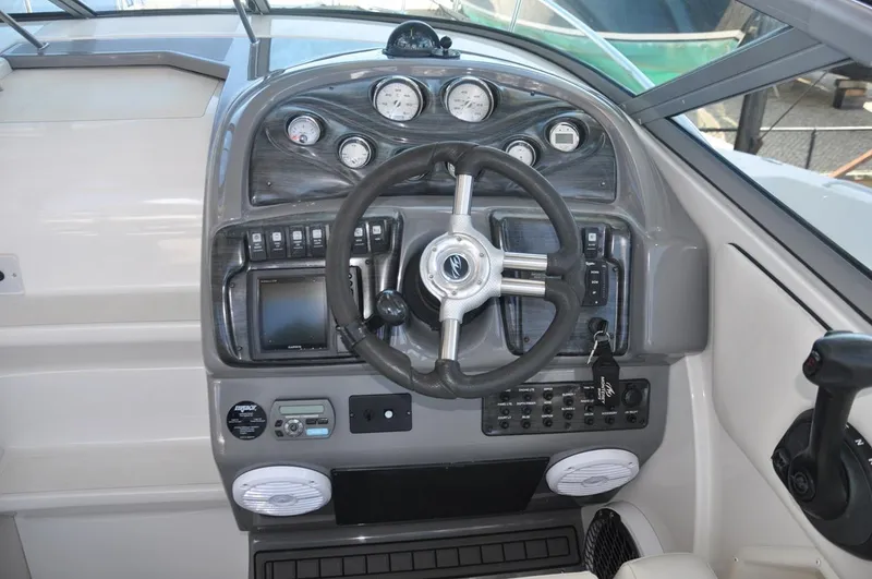 Slide: The Image of 2008 Monterey 270 Cruiser dashboard with steering wheel and instrument panel. - 9