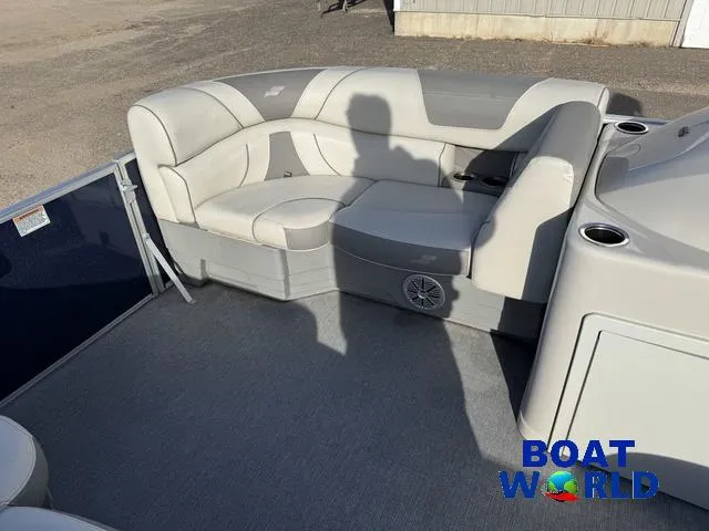 Slide: The Image of 2021 Starcraft EX 20 R Pontoon boat interior with gray seating and cup holders. - 13